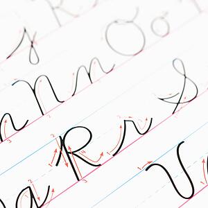 Close up of cursive handwriting practice page.