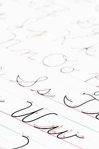 Close up of cursive handwriting practice page