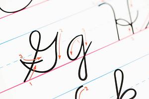 Close up of cursive handwriting practice page