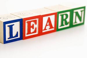 Alphabet toy building blocks spelling the word learn