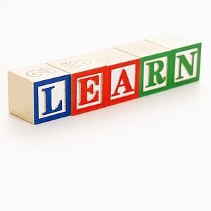 Alphabet building blocks spelling the word learn