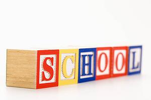 Alphabet toy building blocks spelling the word school