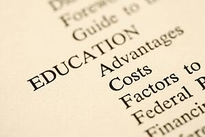 Selective focus of table of contents page relating to education.