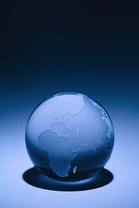 Blue still life of globe showing continents of Europe, Asia and Africa