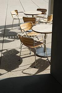 Outdoor tables and chairs on patio in Sydney, Australia.