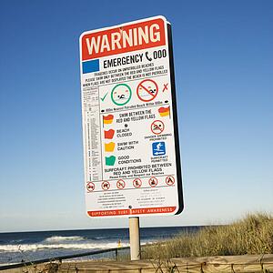 Warning for unpatrolled beach sign on Surfers Paradise, Australia.