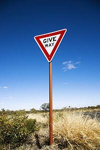 Road sign reading Give Way in rural Australia