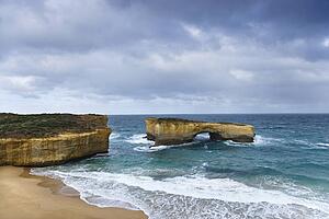 Rock formation in arch shape as seen from Great Ocean Road in Australia