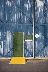 Exterior of building with door and metal siding, Australia