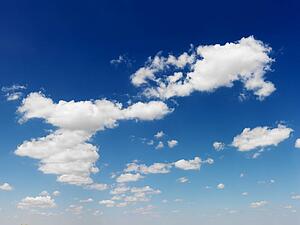 Cumulus cloud formation in blue sky