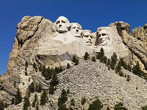 Mount Rushmore National Memorial with mountain and trees
