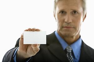 Man holding business card 