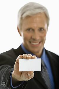 Man holding business card