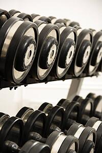 Rack of hand weights on rack