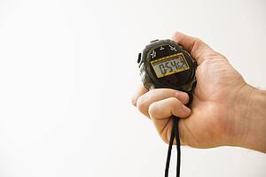 Close-up of hand holding stopwatch