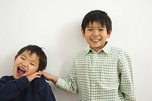 Brothers playing and laughing