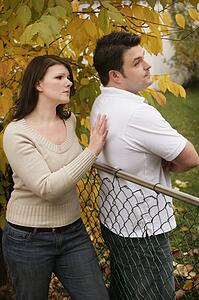 Couple with man resisting reconciliation