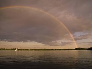 Lake of the woods, Ontario, Canada, Rainbow over the lake