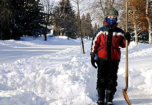 Kid shovelling