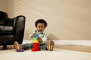 A boy playing with blocks