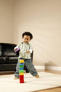 A boy playing with blocks
