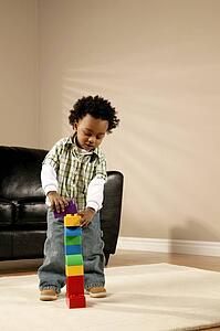 A boy playing with blocks