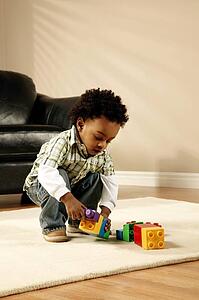 A boy playing with blocks