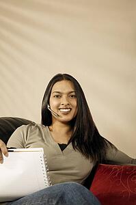 Woman with wireless head set