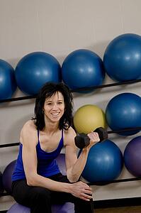 Woman at a gym working out