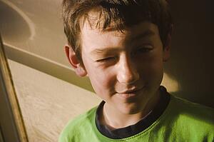 Boy winking