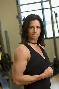 Woman flexing her arm muscles