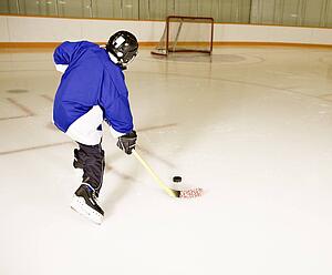 Person playing hockey
