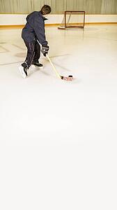 Person playing hockey