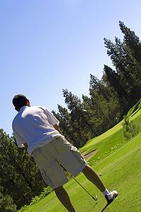Man playing golf