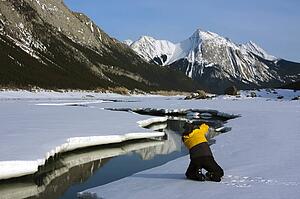 Person on the snow in the Maligne Mountain Range, Alberta, Canada