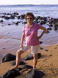 Woman at the beach, Kauai, Hawaii, USA