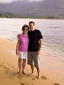 Couple on beach in Kauai, Hawaii, USA