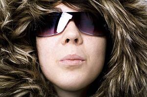 Sunglasses and fur hood