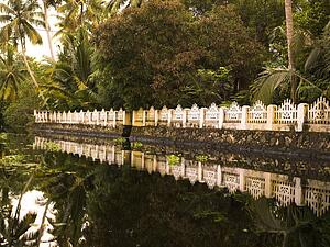 Gate along the water, Kerala, India