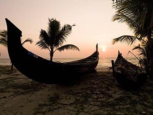 Two canoes on the beach at the Arabian Sea, Kerala, India 