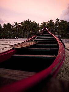 Boat on the beach at the Arabian Sea, Kerala, India 