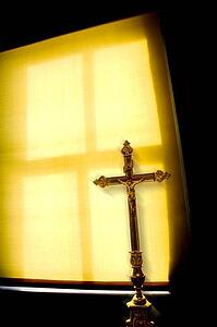 Crucifix next to a window