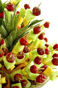 Close up of fruits on sticks