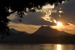 Sunset along the Mekong River at Luang Prabang, Laos, Asia