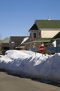Snow piled on edge of street