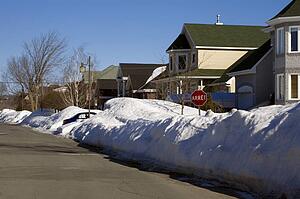 Snow piled on edge of street