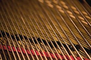 Close up of piano strings