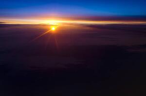 Sunrise over clouds