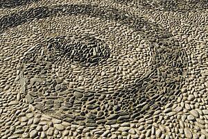 Pattern made of stones in pavement