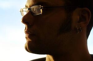 Mid-adult man looking away